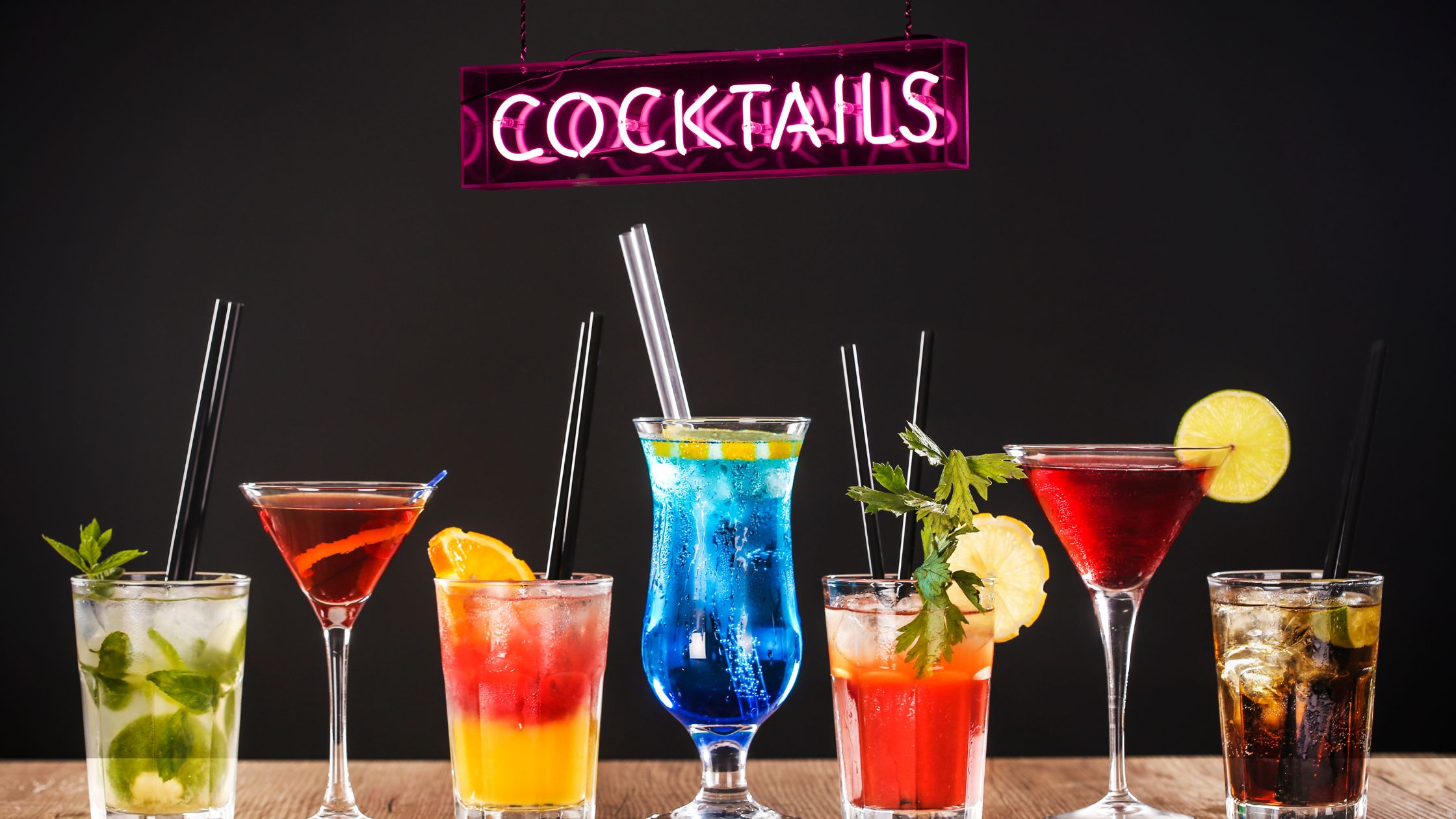 A bottle of Aperol and cocktail illustrations